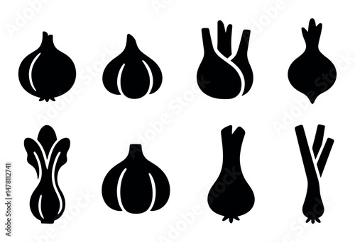 Bold black silhouettes of various vegetables in distinct shapes