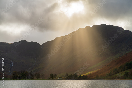 Obraz na płótnie Buttermere lake and Haystacks with sunbeams in Lake District. England w salonie