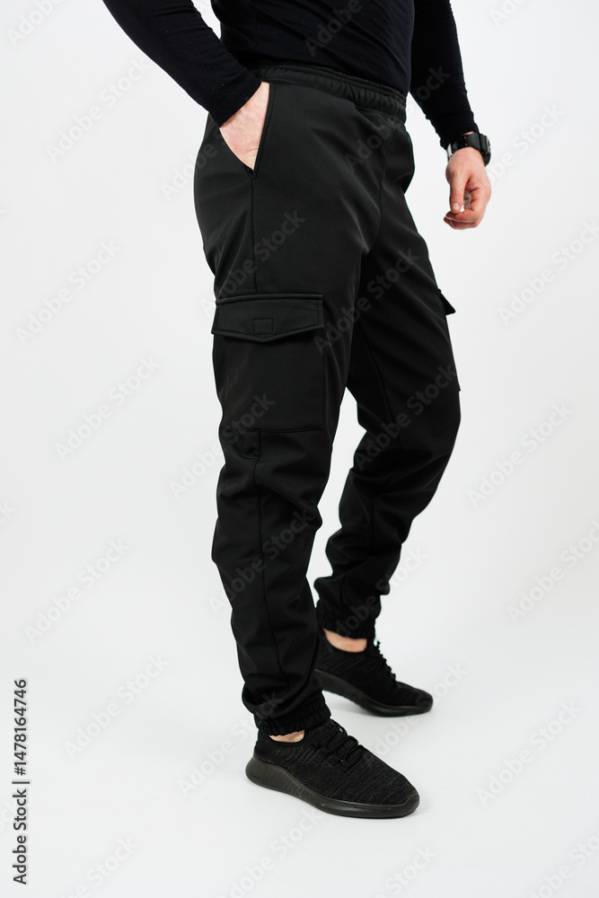 Discover the Stylish Black Cargo Pants that are perfect for an Active Lifestyle. These pants are versatile, offering comfort and functionality, making them ideal activewear for men who value fashion