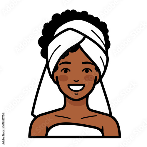 Black woman smiling with towel wrap on hair in a cheerful style  