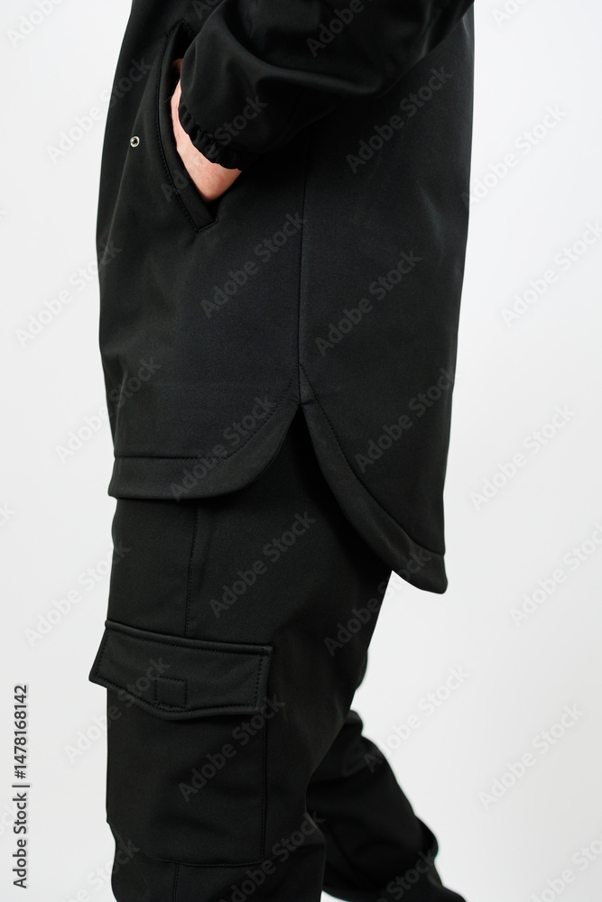This stylish black outfit showcases a modern jacket paired with cargo pants, perfect for creating a trendy streetwear look that is both fashionable and comfortable for everyday wear