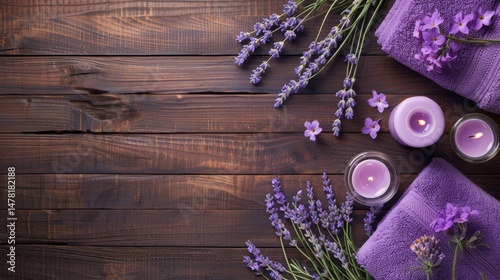 Relaxing spa setup featuring candles, essential oils, and fresh flowers, creating a calming atmosphere.