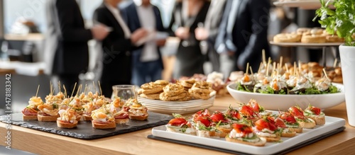 Elegant Office Gathering with Gourmet Canapes and Professional Atmosphere