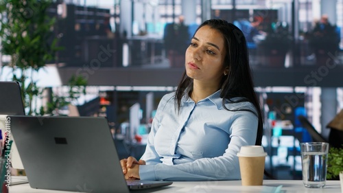 Disconnected entrepreneur dealing with depersonalization and being detached from reality, lose focus at work. Indian business manager suffers from a disorder, is a workaholic. Camera A.