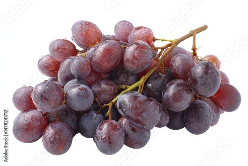 A bunch of red grapes glistening with water droplets.