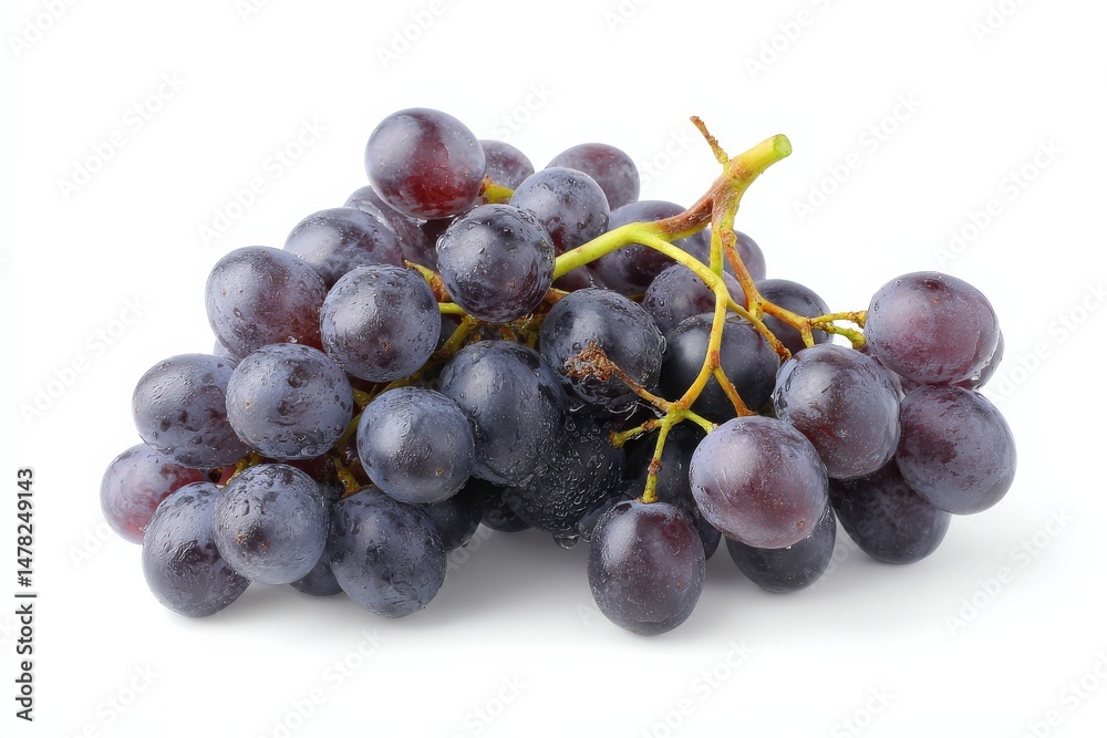 Fototapeta premium A bunch of dark-purple grapes, glistening with water droplets, sits against a bright white background.