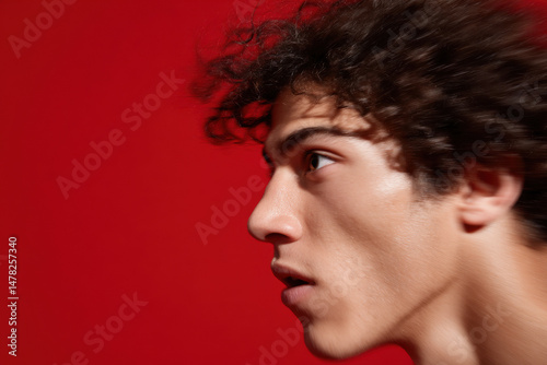 portrait of athlete in motion positioned on left side of frame