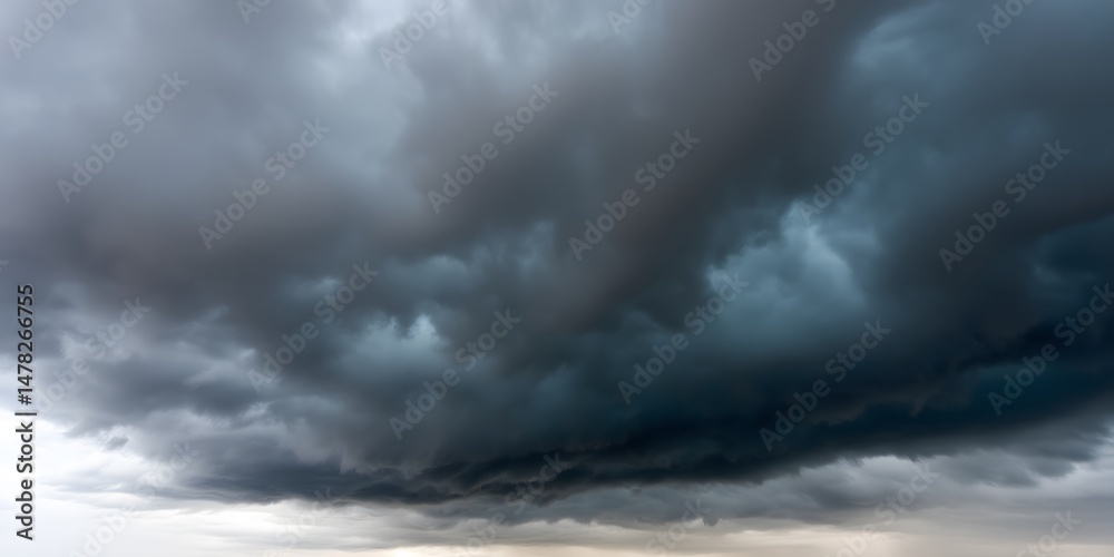 Ominous Cloudscape: The imposing cloudscape, filled with dark, swirling storm clouds, creates a sense of foreboding, hinting at the raw power and beauty of nature's most dramatic displays. Ominous Cloudscape: The imposing cloudscape, filled with dark, swirling storm clouds, creates a sense of foreboding, hinting at the raw power and beauty of nature's most dramatic displays.