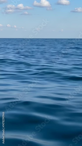 Wallpaper Mural Vertical video Blue tranquil sea with waves and skyline Torontodigital.ca