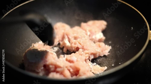 Mixing Ground Chicken In Pot