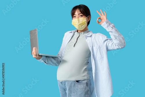 Pregnant Asian woman in med...