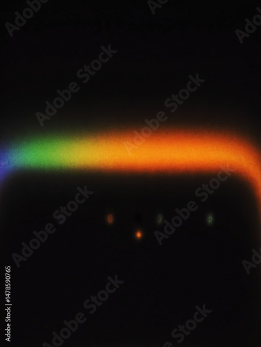 Spectrum Brilliance: A vibrant display of light, showcasing a spectrum of colors from a prism of light.