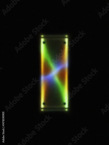 Glowing Geometric Form in Darkness: A vibrant geometric shape, illuminated by a captivating array of colors, is set against the deep expanse of night. The form radiates energy and intrigue.