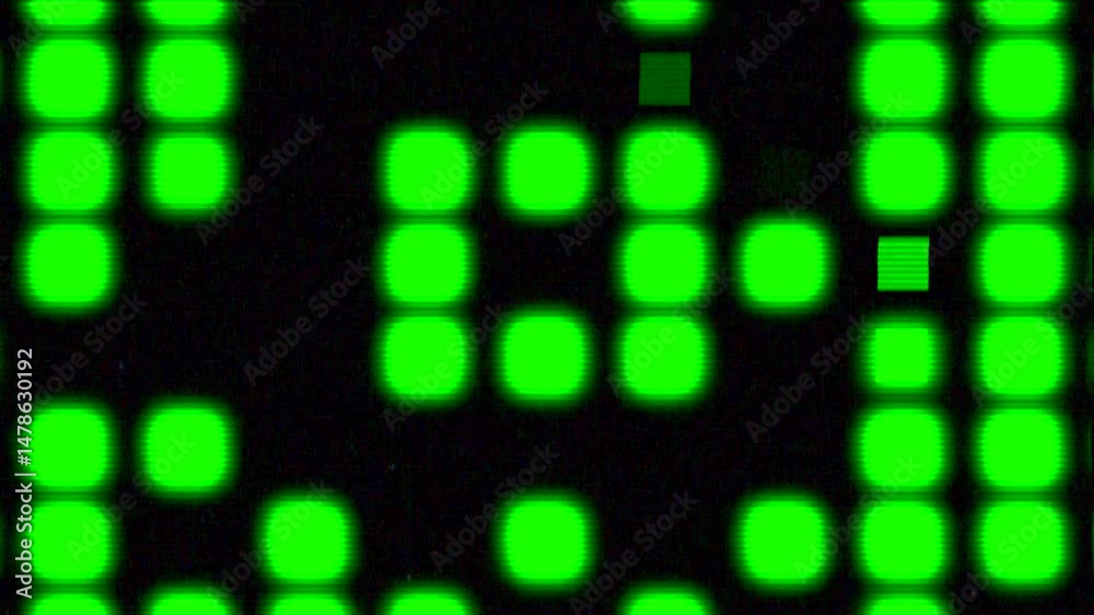 Green glowing dots blinking on a black background