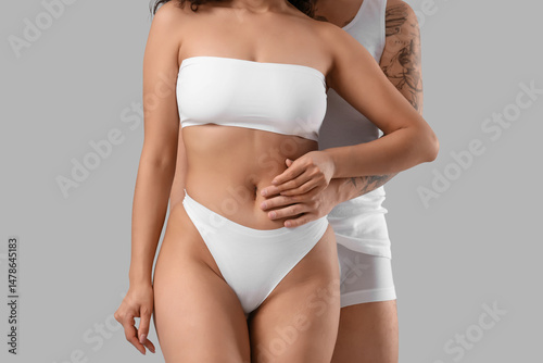 Couple in white underwear e...