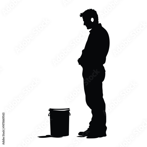 Man looking at empty bucket in silence