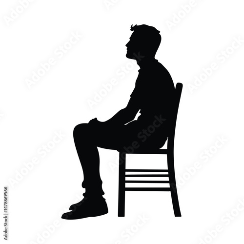 Man sitting in silence on chair silhouette