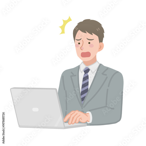 PCを見て驚くビジネスマン