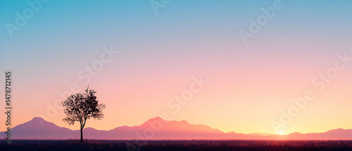 Peaceful Sunset Landscape With Silhouetted Tree And Mountains