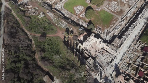 Aerial drone shot of the ancient city of Ephesus, the library of Celsus and the ancient Roman theater on a sunny day. High quality 4k footage