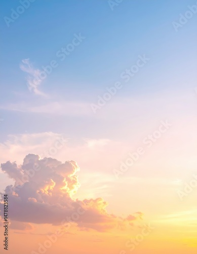 A breathtaking sunset paints the sky in vibrant hues of orange, pink, and purple, with fluffy clouds silhouetted against the glowing sun as it descends.