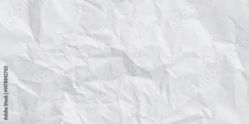 Closeup of white crumpled paper for texture background. Sheet of printer paper wrinkled background.