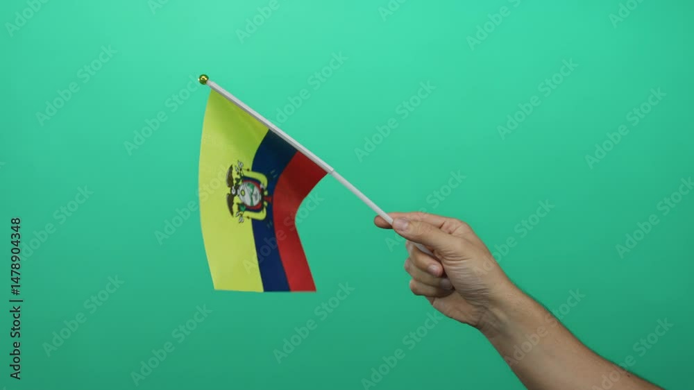 Man holding ecuador flag against green background, showcasing pride and identity.