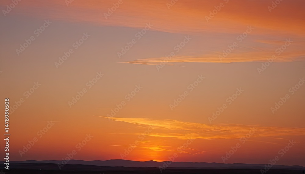Fototapeta premium Vertical shot of the golden sunset sky over the Pacific Ocean 1 
