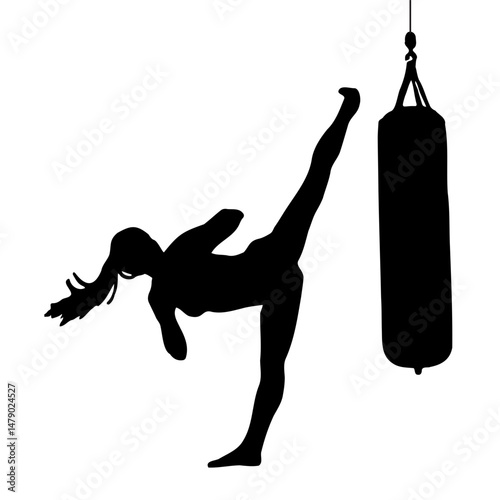 silhouette of a person exercising with a punching bag