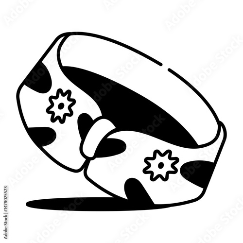 A doodle style icon showing hairband 
