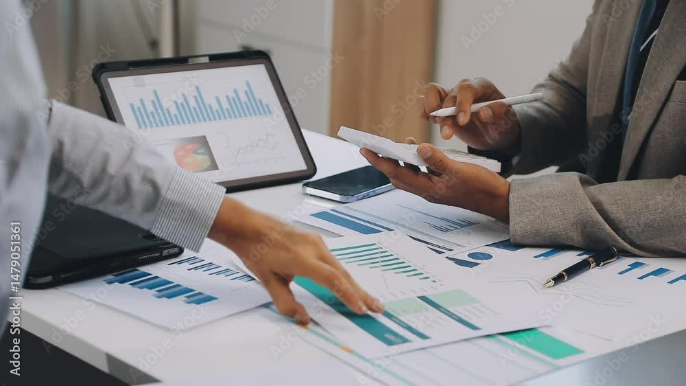 Auditor and accountant team working in office, analyze financial data and accounting record with calculator. Accounting company provide finance and taxation planning for profitable cash flow. Insight