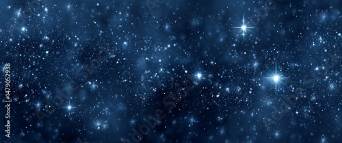 Wallpaper Mural A panoramic view of the starry night sky with numerous stars shining brightly against a dark blue background. Torontodigital.ca