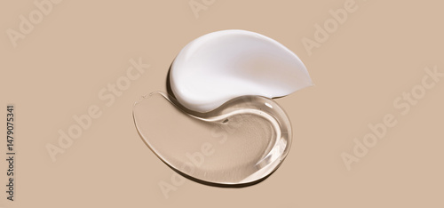 creamy texture of cosmetic samples on a pastel beige background