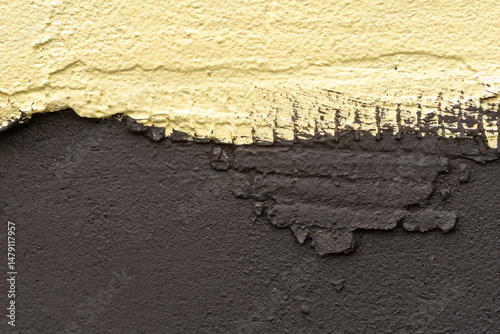 The texture of the yellow-brown surface