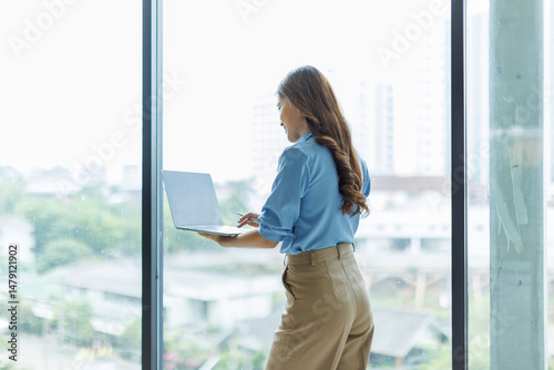 Attractive asian woman, Manager with laptop stands in office area of coworking space
Free Download Attractive asian woman, Manager with laptop stands in office area of coworking space
- GFXLoad