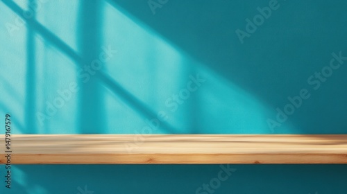 Sunlit Wooden Shelf Against Teal Wall: Minimalist Product Display