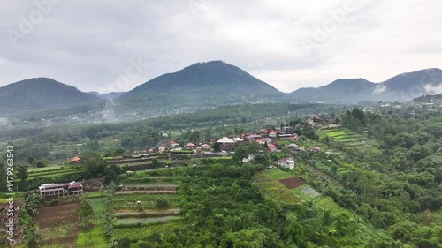 Wallpaper Mural Rural of bali, Indonesia. Aerial of road and hills with rice terraces, agriculture, cloudy. Torontodigital.ca