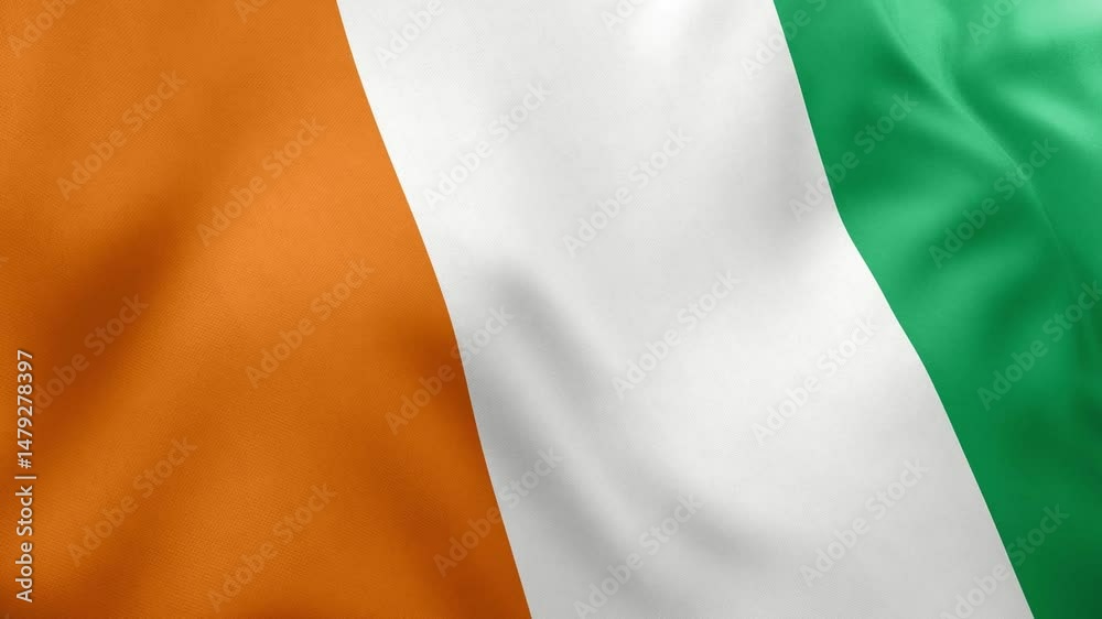 Close up realistic animation of Ivorian national flag (Côte d'Ivoire) waving gently. Orange, white, green vertical stripes. Seamless loop, national pride themes