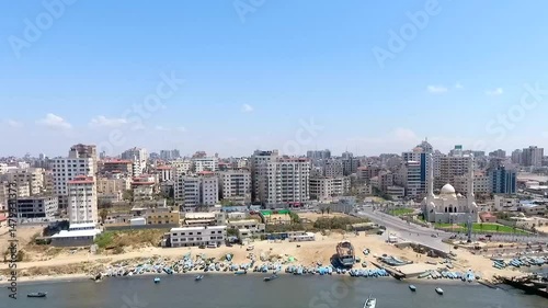 Gaza City, Gaza Strip – Aerial drone footage shows an overview of Gaza City, capturing densely packed buildings