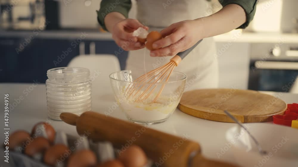 Woman adding egg and sugar to bowl with flour, preparing dough, following recipe