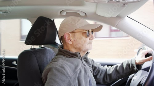 Senior Man Driving a Car and Enjoying a Casual Day Outdoors
