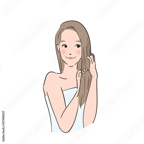 丁寧にヘアケアをするロングヘアの女性