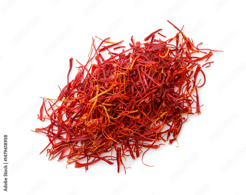 Fototapeta premium Heap of dried saffron spice close-up on a white. Top view