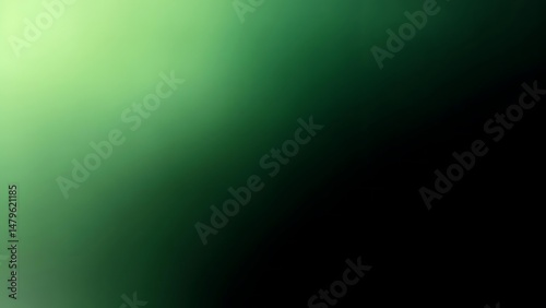 Emerald green gradient subtly transitions into a deep captivating darkness creating a visually stunning abstract backdrop perfect for design projects needing a sophisticated and mysterious atmosphere
