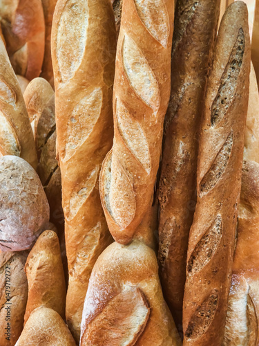 Freshly baked bread varieties displayed in a local bakery showcasing artisanal craftsmanship and warm colors of loaves