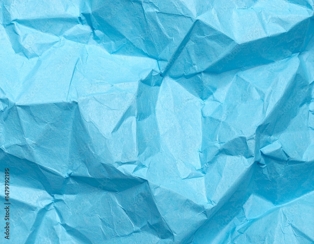 Obraz premium Abstract light blue paper texture background. Texture of crumpled craft paper. Paper background. Recycled blue paper backdrop in close up. sky blue Textures. Wallpaper.
