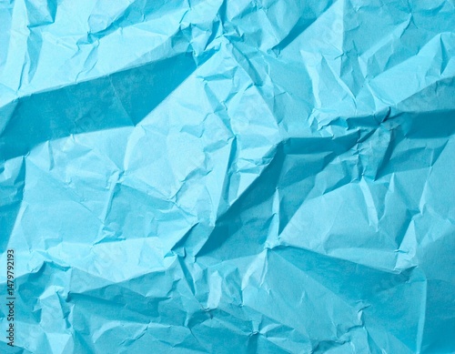 Abstract light blue paper texture background. Texture of crumpled craft paper. Paper background. Recycled blue paper backdrop in close up. sky blue Textures. Wallpaper.