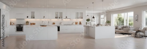 Gleaming white kitchen flows into expansive living room, showcasing high-end finishes,  large windows,  spacious