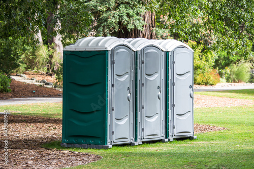 row of public toilet in the garden.