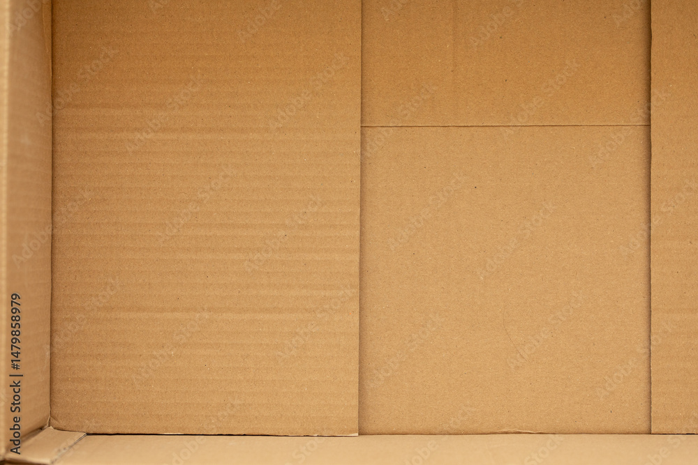Fototapeta premium High-resolution image of an empty cardboard box interior. Perfect for design and packaging projects.